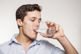 manual wash down the capsules with a glass of water